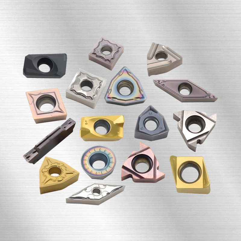 Carbide cutting inserts in assorted shapes and chipbreaker geometries