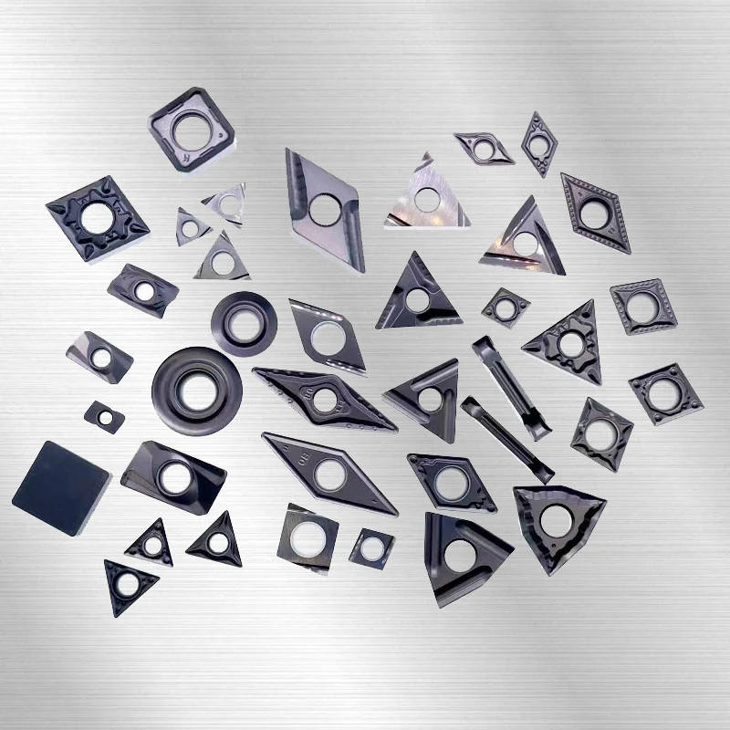 Assorted cutting inserts with round, square, triangular and diamond shapes
